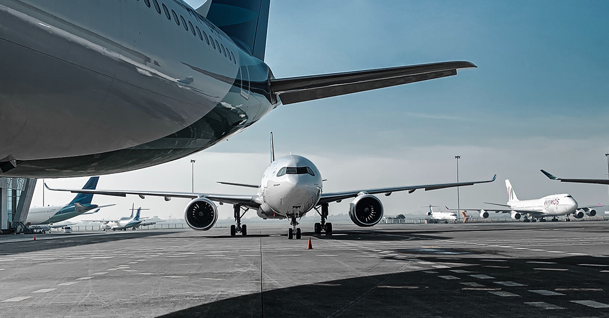 Aircraft parked at airport waiting to taxi to runway 