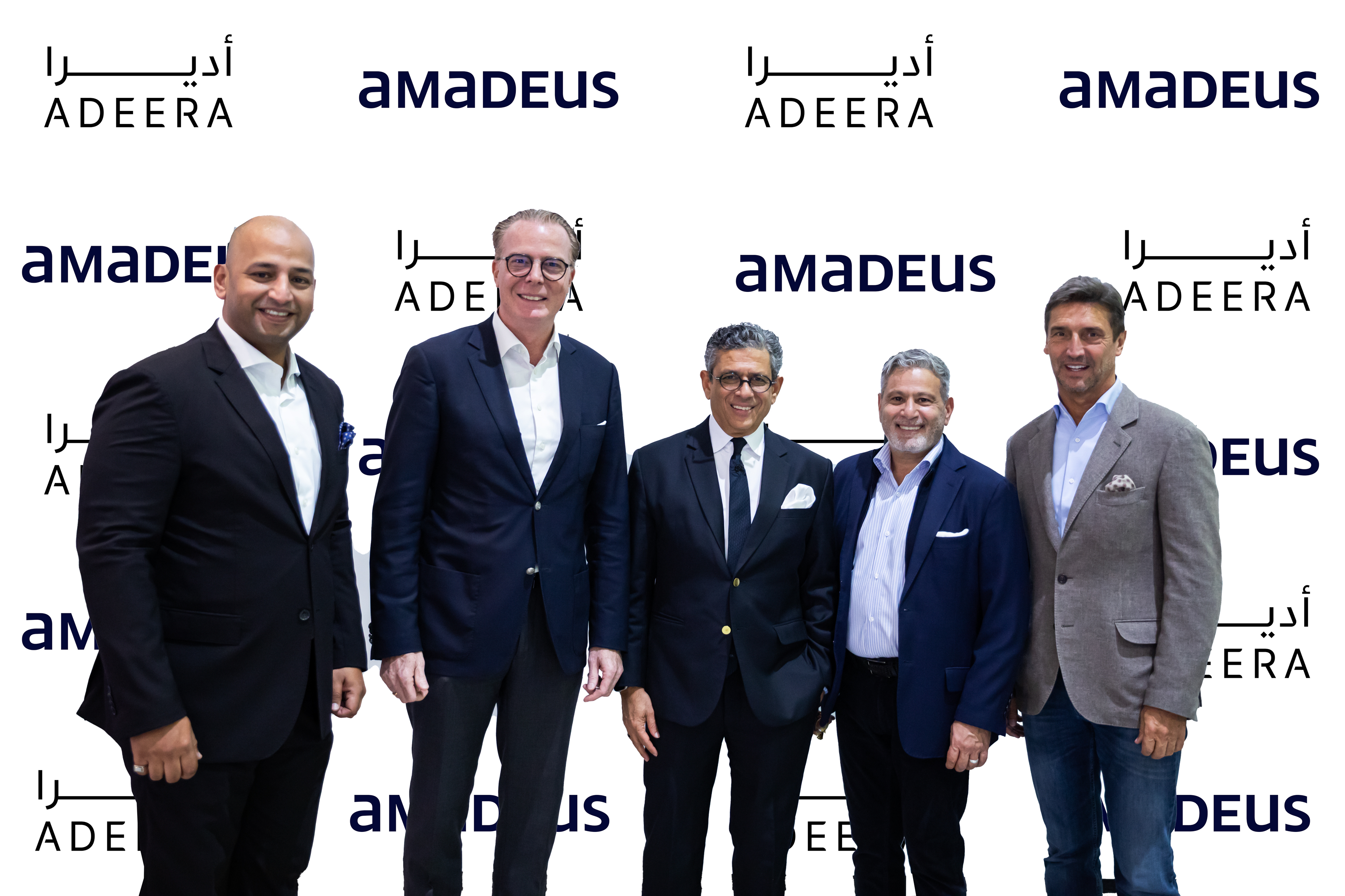 Photo of five Adeera and Amadeus executives at the signing ceremony.