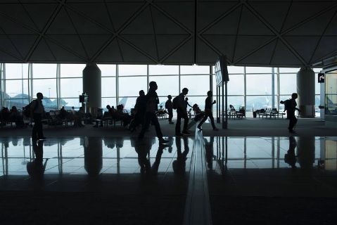 Passengers traveling through airport